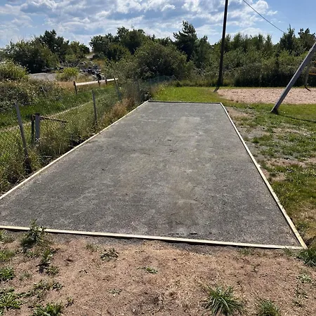 Backstugan - Litet Hus Med Storslaget Laege