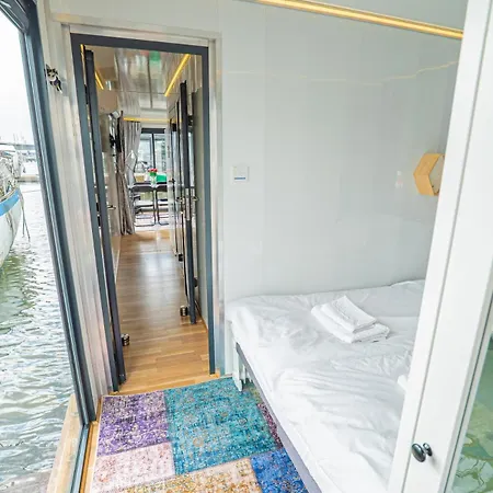 At Sea Houseboat With Rooftop In The Heart Of By Beyond *