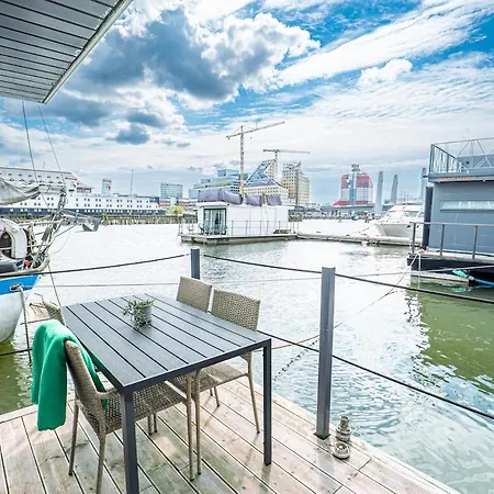 At Sea Houseboat With Rooftop In The Heart Of By Beyond *